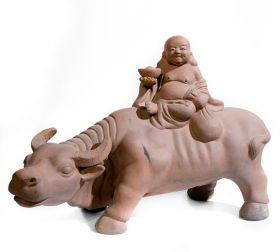 Statueta Peste si copil cu pepita prosperitatii Statueta Buddha razand pe bivol